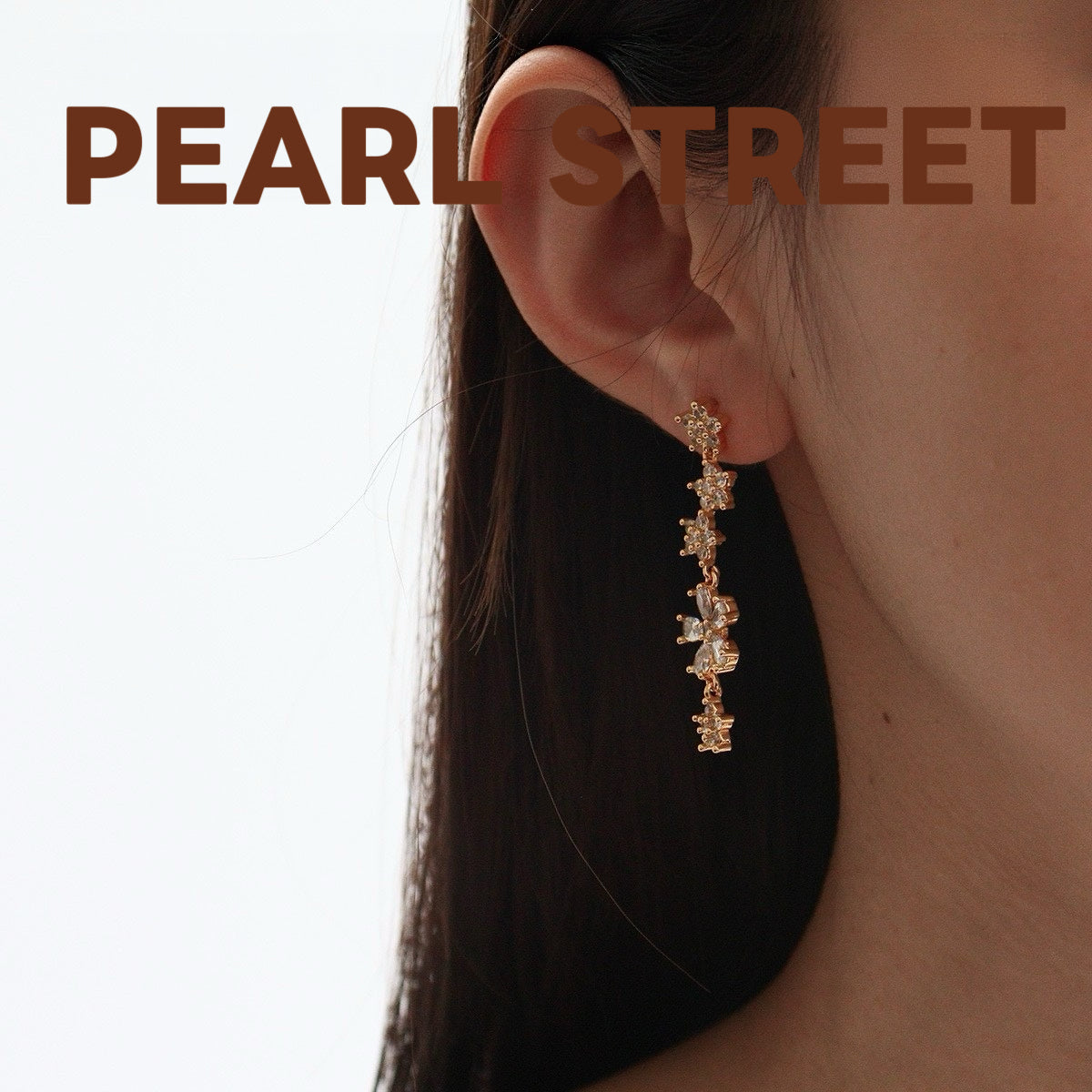 Boucles d'oreilles pendantes en laiton doré et zircon, motif fleur | Pompon floral en cristal