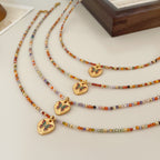 Collier pendentif papillon délicat en perles | Ras-de-cou en zircon coloré 