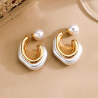 Boucles d'oreilles sculpturales double créoles en perles et or