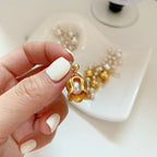 Boucles d'oreilles asymétriques en perles de muguet 