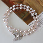Collier ras-de-cou romantique en cristal pavé, papillon et perles 