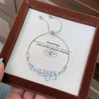 Bracelet coulissant fantaisie en émail bleu avec papillon et fleurs 