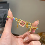 Bracelet à breloques en émail avec panda et fleurs fantaisie | Doré 