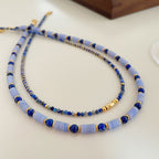 Ensemble de colliers superposés en agate dentelle bleue et lapis-lazuli 