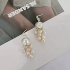 Boucles d'oreilles à pompon en perles de muguet | Finition mate