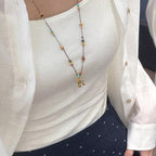 Collier pendentif chien ballon fantaisiste avec perles turquoise 