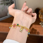Bracelet à breloques en émail avec panda et fleurs fantaisie | Doré 