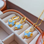 Ensemble de bijoux en émail bleu en forme de cœur floral | Collier et boucles d'oreilles 