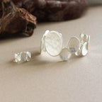 Ensemble bracelet manchette et bague ajustable à disque sculptural 