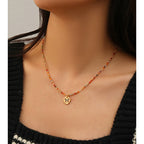 Collier pendentif papillon délicat en perles | Ras-de-cou en zircon coloré 