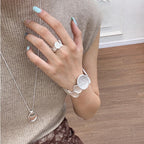 Ensemble bracelet manchette et bague ajustable à disque sculptural 